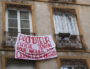 Banderole sur la façade d'un immeuble rue Jangot, à l'initiative du collectif "la Guillotière n'est pas à vendre". Lyon 7ème lundi 4 février 2019. ©MG/Rue89Lyon